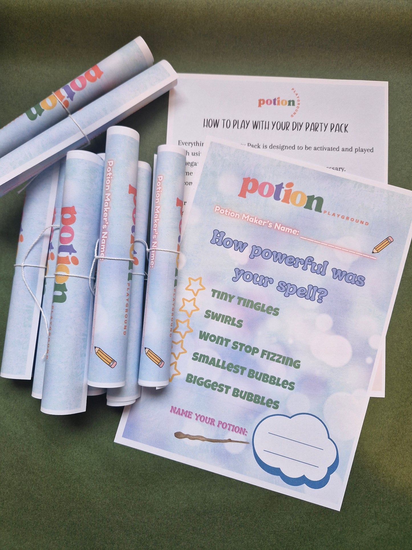 Potion-themed party favor items including cards and markers on a green background