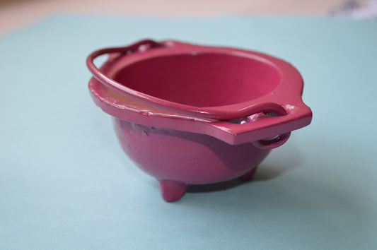 pink cast iron cauldron with handle
