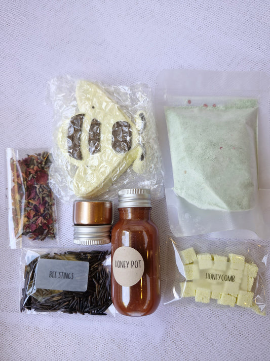 inside veiw of the contents of the buzzing bee potion kit with bee fizzers.