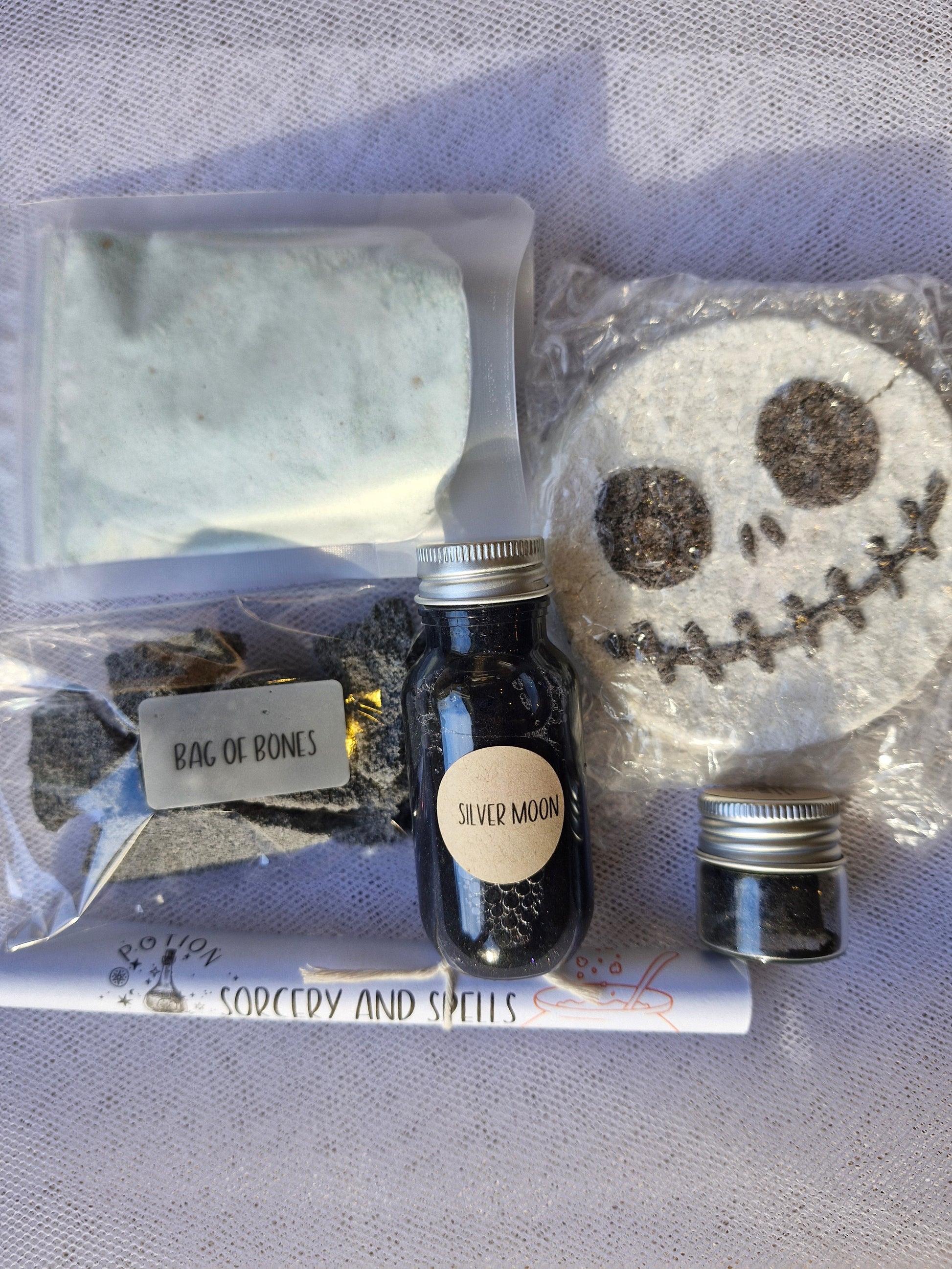 Ingredients from sorcery and spell potion kit with skull fizzer