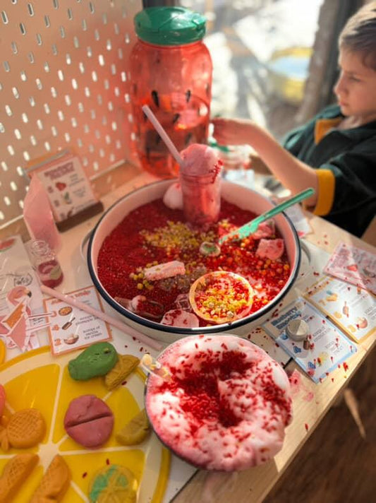 child playing with fruit theme potion fizzers