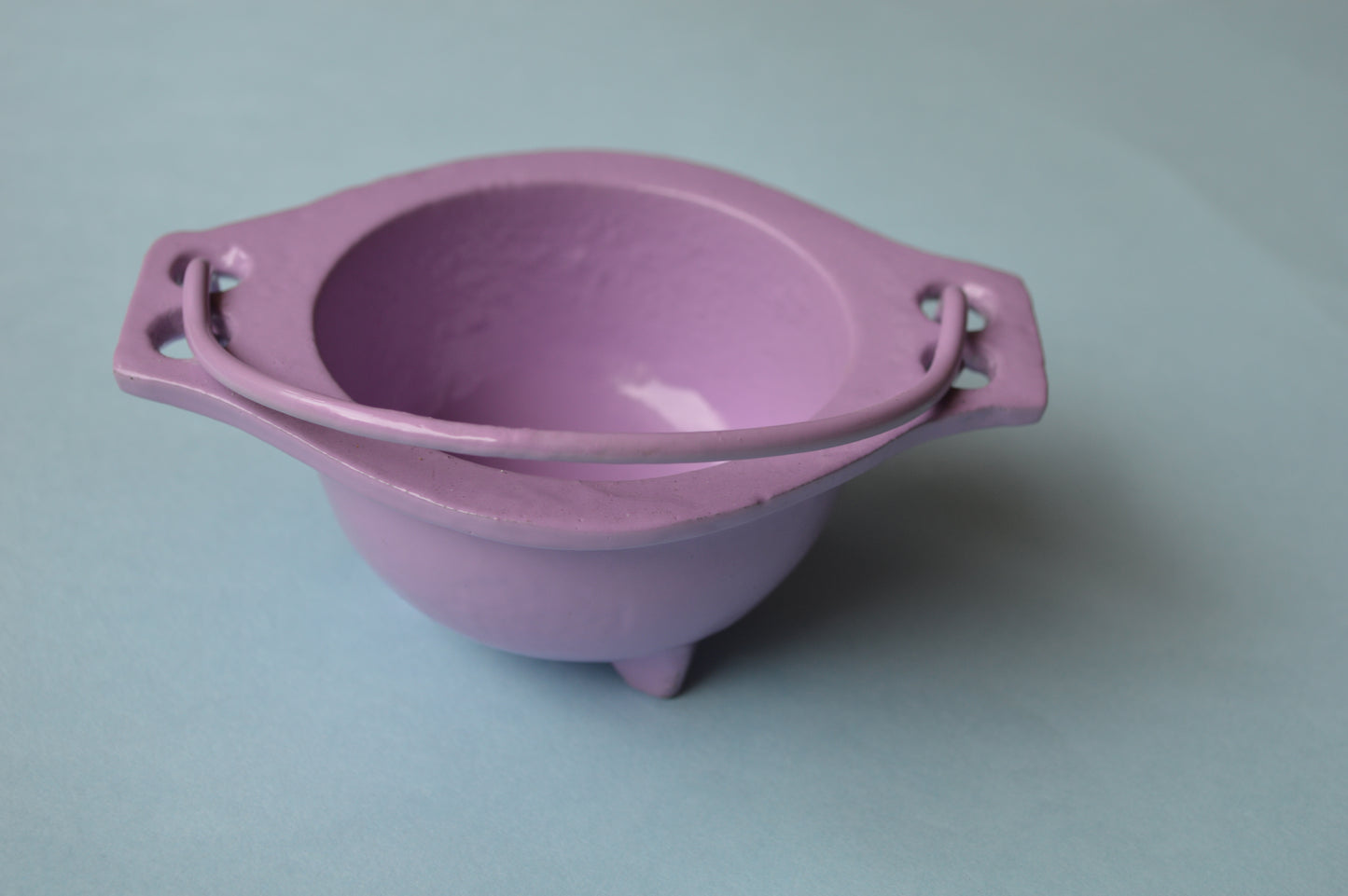 purple cast iron cauldron with handle